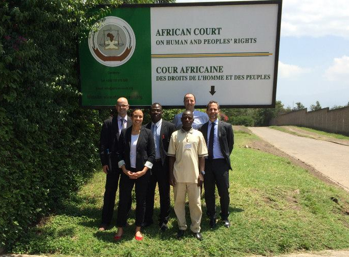 Konate and legal team outside Court